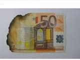 Купувам обгоряли и повредени евро долари и други валути. Цената зависи от това колко е повредена бан