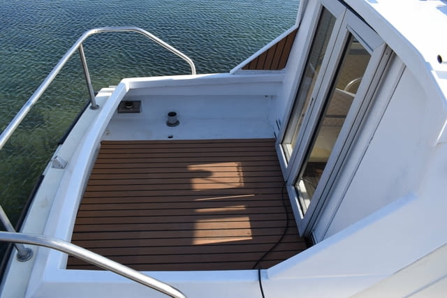 Скандинавска моторна лодка тип Pilothouse, глисираща, 6.60м на 2.35м. Двигател Volvo Penta TMD40A, 6 - снимка 4