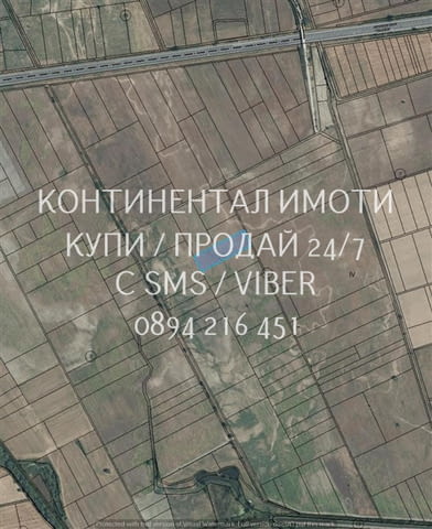 Код 63027. Поземлен имот 8000м2, кат. 4-та, на около 1, 5 км северно от селото и на около 500м от АМ - снимка 1