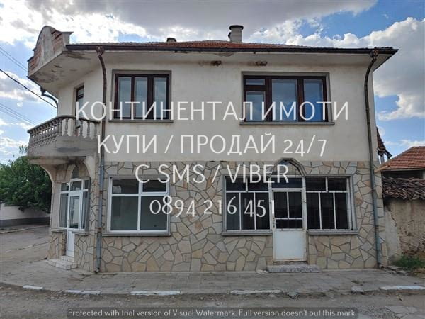 Код 62930. Двуетажна тухлена къща 280м2 с двор 1200м2 с втора малка къща и гаражи. Имотът е 180 м от - снимка 1