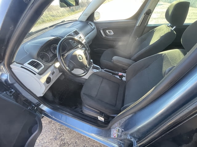 Skoda Roomster 1.6i, 105 кс., автоматик, панорама, парктроник, 142 000 км. реални километри, обслуже - снимка 7