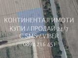 Код 63183. Поземлен имот 2200м2, който се намира непосредствено до пътя, и наоколо 1300м от селото,