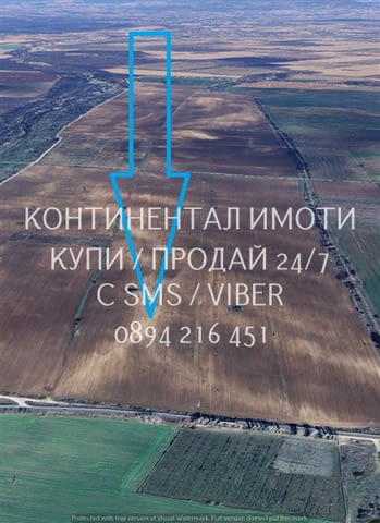 Кодг 62815. Поземлен имот нива 16дка с лице на шосето 130м преди селото. Отдадена под аренда, възмож - снимка 4