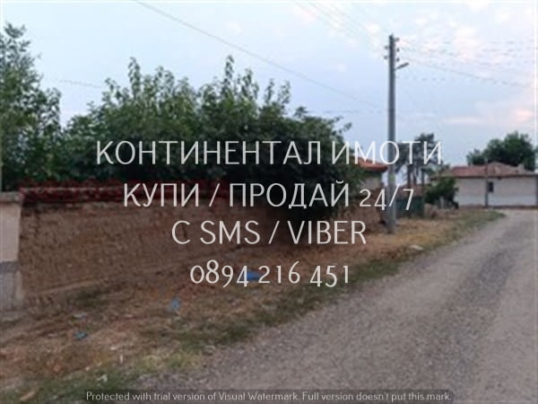Код 70035. Слънчев парцел 500м2 - отличен регулиран поземлен имот в сърцето на селото. Имотът се нам - снимка 5