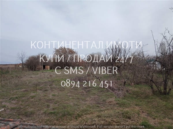 Код 62321. кодо.62321. Дворно място 2000м2 с ток и вода с партида и функциониращ кладенец.Имотът се - снимка 3